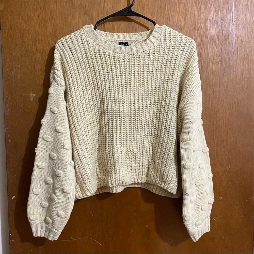 Size M Cream Moon and Madison knit sweater with puffs on the sleeves